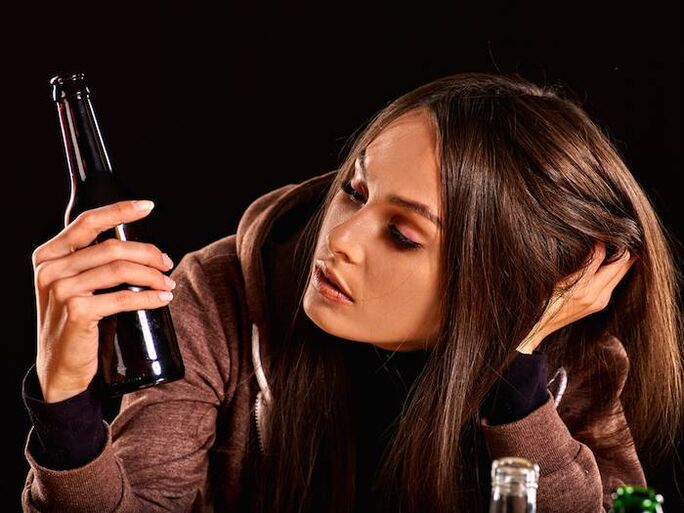 Girl with a bottle to get rid of addictions